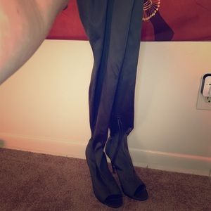 Knee high sage peep toe boot.
